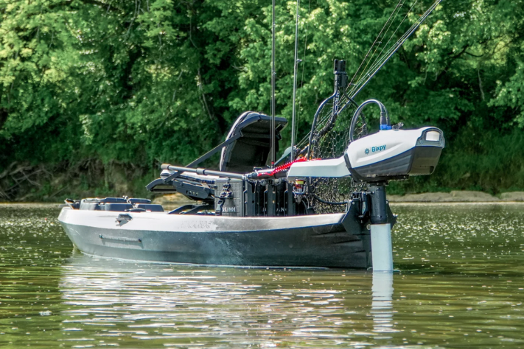 N3 motor on a small boat in the water, ready to go fishing