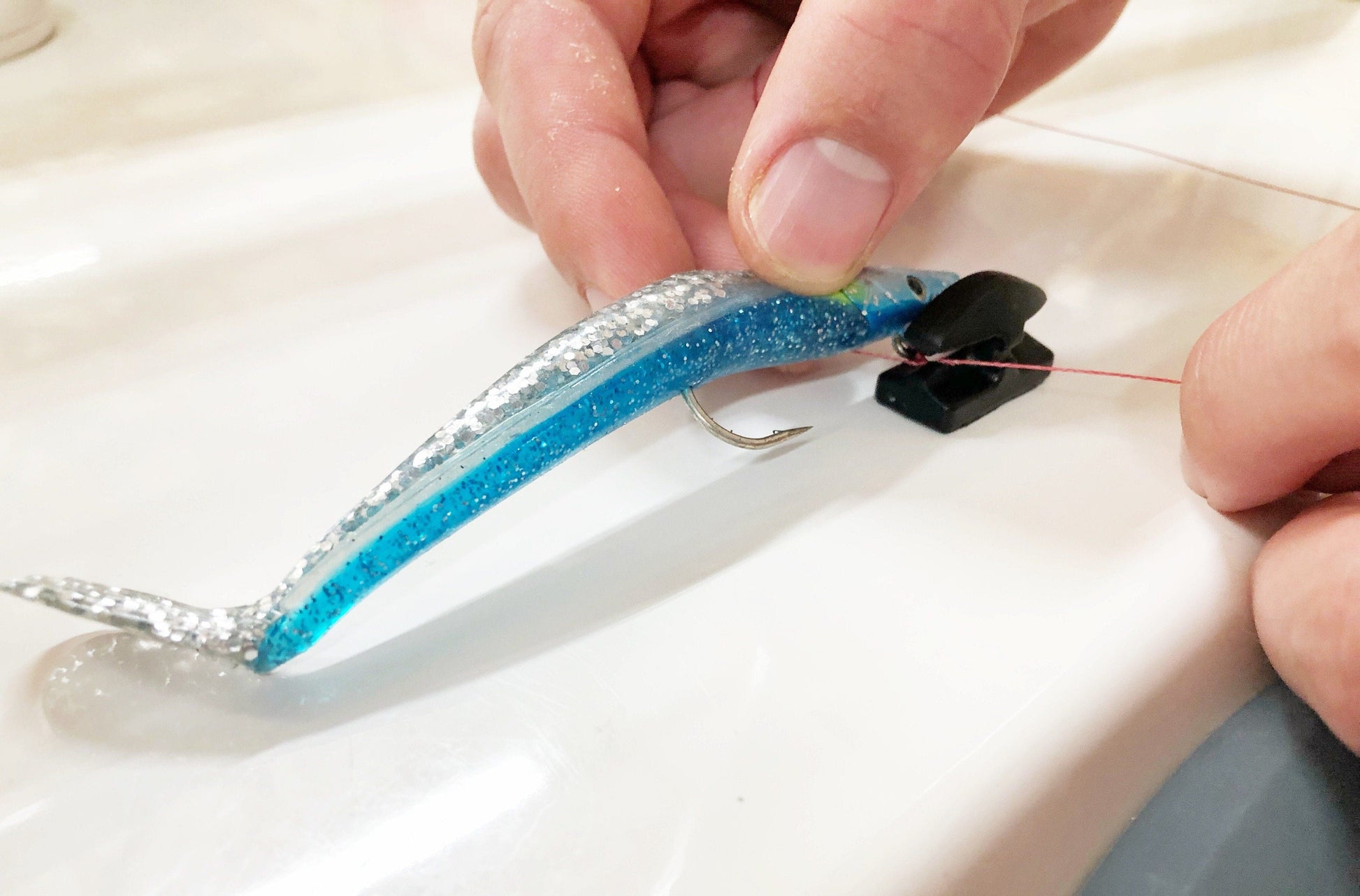 Line Cutterz Ceramic Blade Peel & Stick Flat Mount on a boat used to cut line around a lure