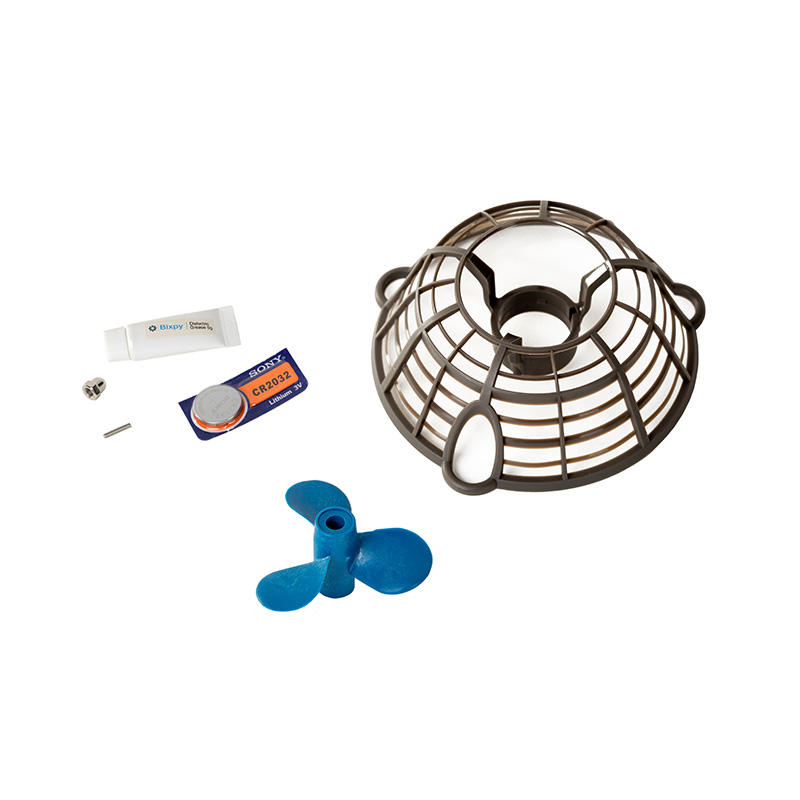 Bixpy Motor Care Kit components laid out, including a propeller guard, lubricant tube, screws, a blue propeller, and a rubber fitting.