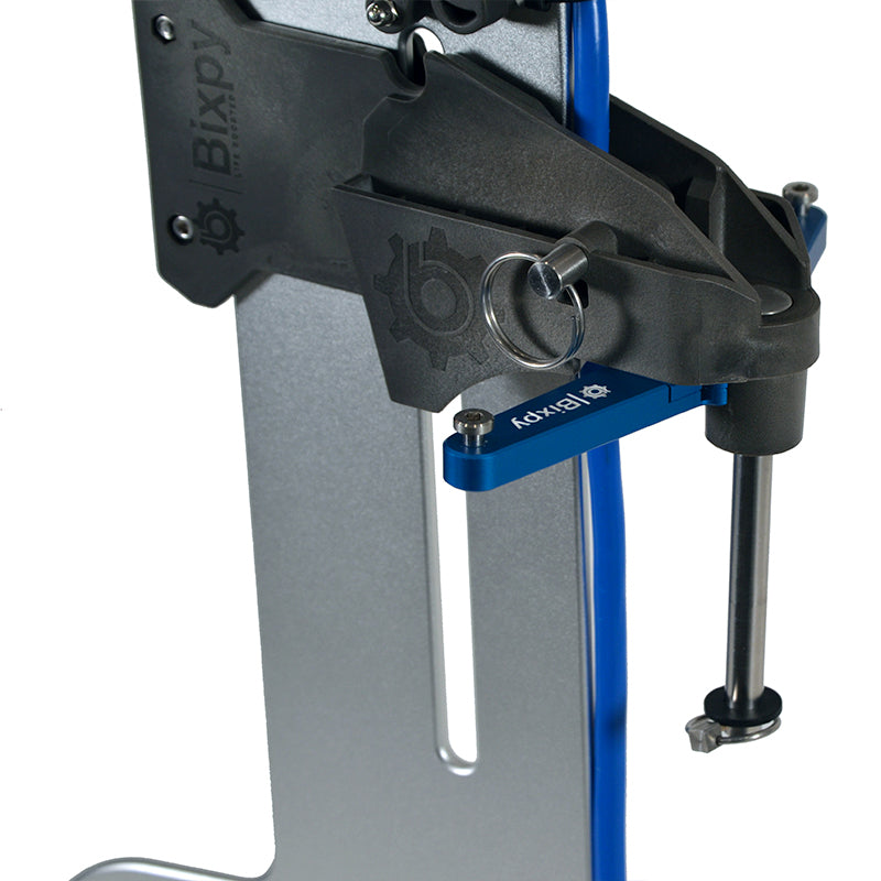 Close-up of the upper section of a Bixpy rudder adapter, showing its black clamping mechanism, blue adjustment lever with ring, and connection to a blue vertical shaft.