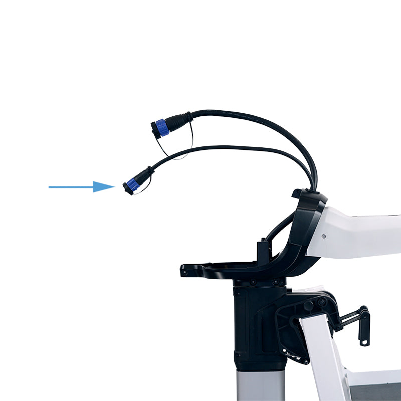 Close-up of the top of a white Bixpy electric outboard motor, showing two black cables with blue connectors, with an arrow pointing to the controller cable cap.