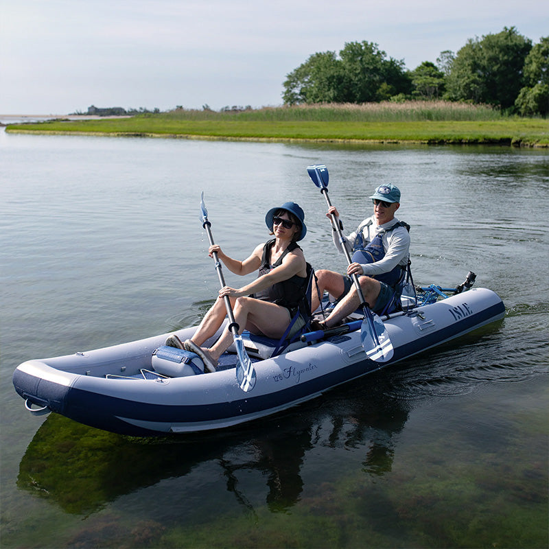 Person fishing from their watercraft with the ISLE/Bixpy K-1 Outboard Kit