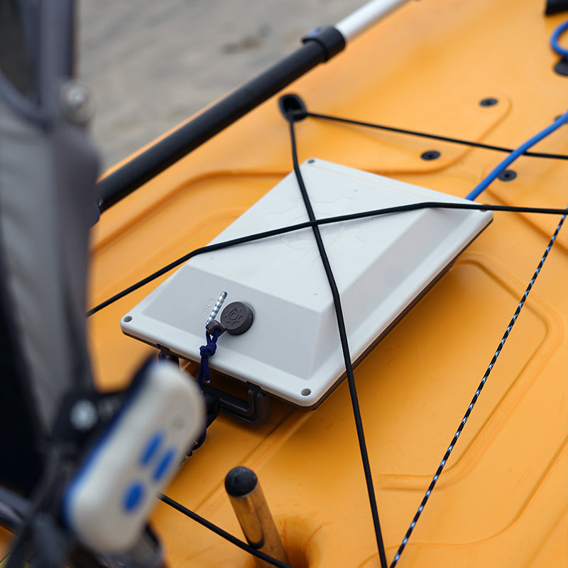 Bixpy Battery Pack securely mounted on a kayak.