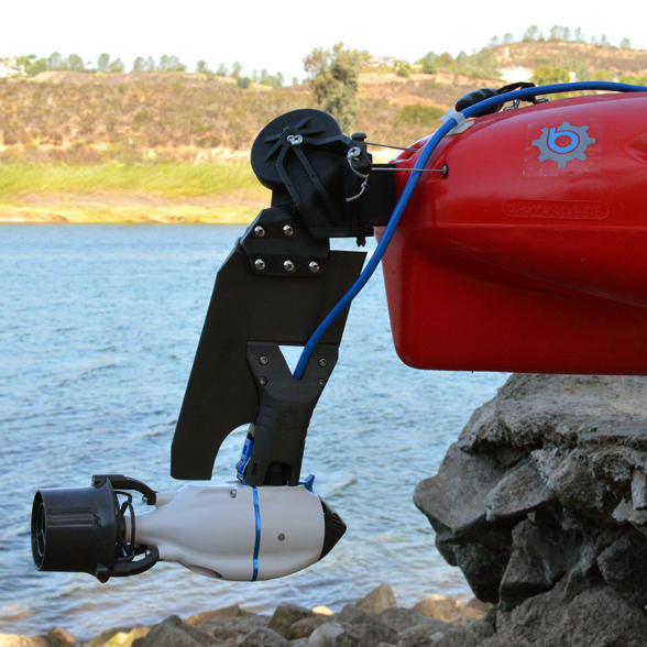 Bixpy Hobie® Twist & Stow Rudder Blade with J-1 Motor mounted on Hobie kayak stern, showing motorized rudder integration with power cable and steering system.