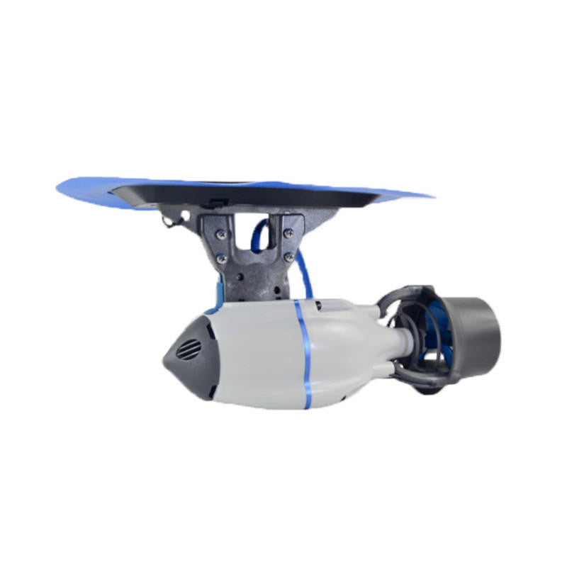 White Bixpy Jet electric motor attached to a black Glue-On Fin Box Adapter with a blue adhesive patch and blue cable, on a white background.