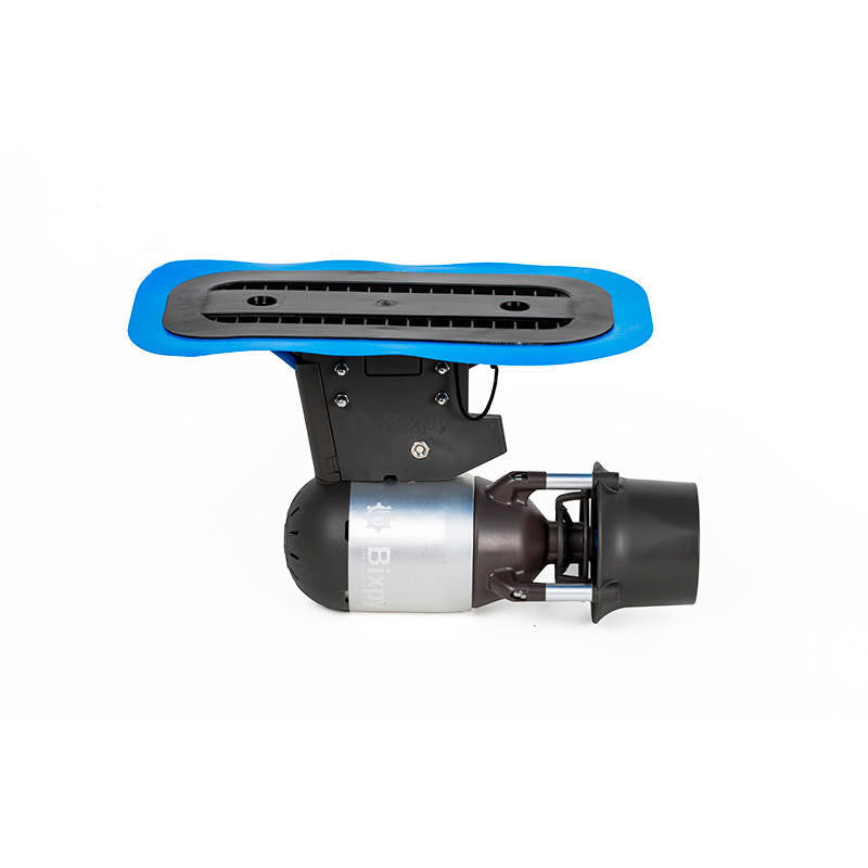 Bixpy Jet electric motor attached to a black Glue-On Fin Box Adapter with a rigid top plate and blue adhesive patch, on a white background.
