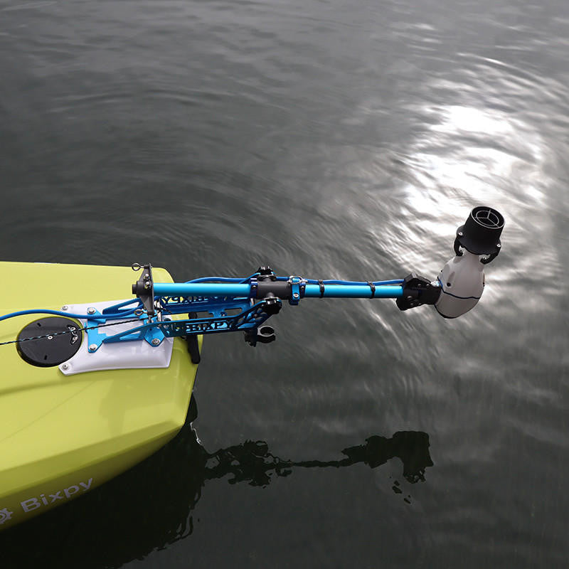 Bixpy Jet Motor mounted on a kayak, seen from above the waterline. The blue Bixpy adapter and motor housing are visible.