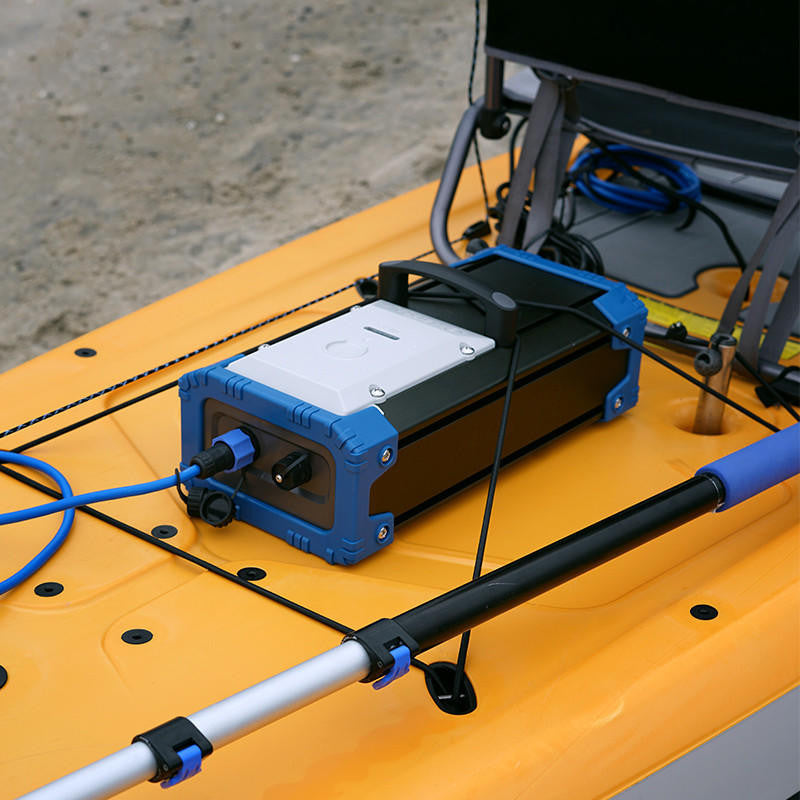 Bixpy battery pack secured to a kayak, ready to power the Bixpy jet motor.