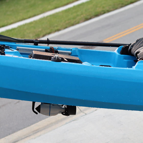 Bonafide Pod Adapter with Bixpy J-1 Motor installed beneath blue Bonafide kayak, showing integrated pod-mounted motor setup for on-water propulsion.