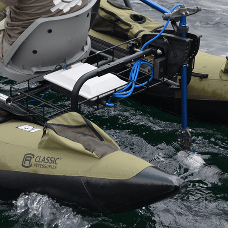 Bixpy Jet electric motor submerged and propelling an olive green Classic Accessories pontoon boat via a blue and black universal transom mount.