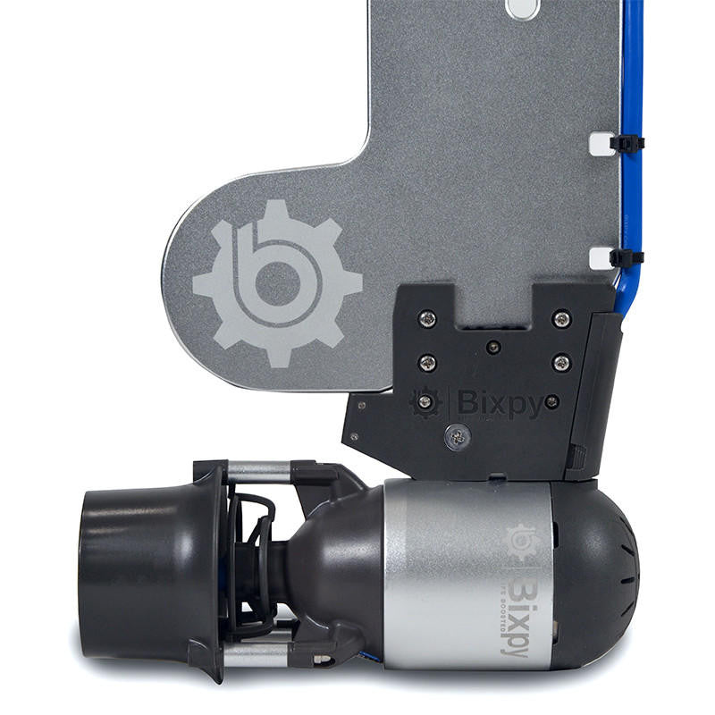 Close-up, bottom view of a Bixpy Jet electric motor connected to the lower section of a gray rudder adapter, showing mounting details.