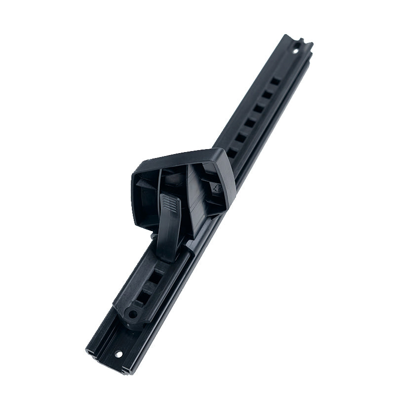 Single black mounting track with a square raised section and latch, which is a component of the Bixpy Foot Pedal Steering System, on a white background.