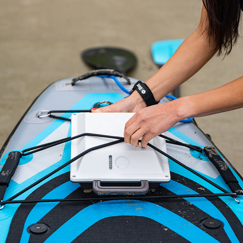 Bixpy battery pack and remote control installed on a inflatable kayak.