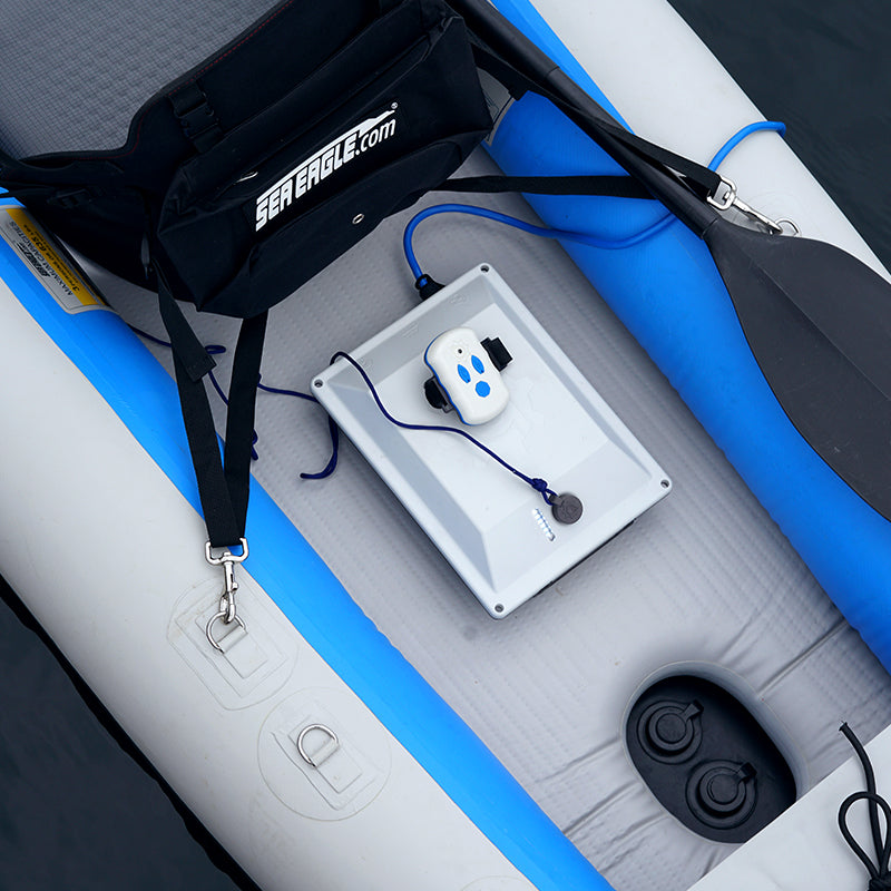 Bixpy battery pack and remote control installed on a Sea Eagle inflatable kayak.