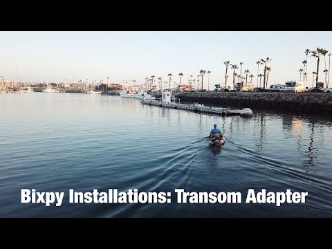 Bixpy K-1 motor installation on a kayak with transom adapter and pole steering conversion.