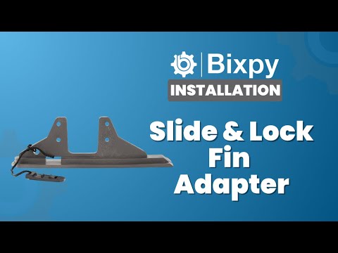 Video tutorial demonstrating the installation of a Bixpy Slide & Lock Fin Adapter, showing motor attachment and fin plate insertion.