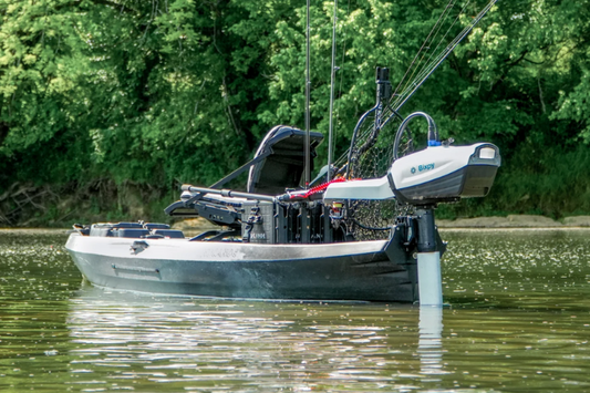 N3 motor on a small boat in the water, ready to go fishing