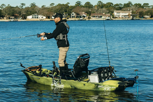 Man fishes from Hobie Kayak sporting the Bixpy K-1 Outboard Kit