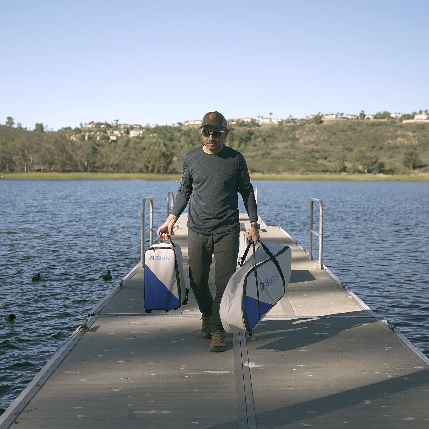 n-3 motor bah carried by man by the lake