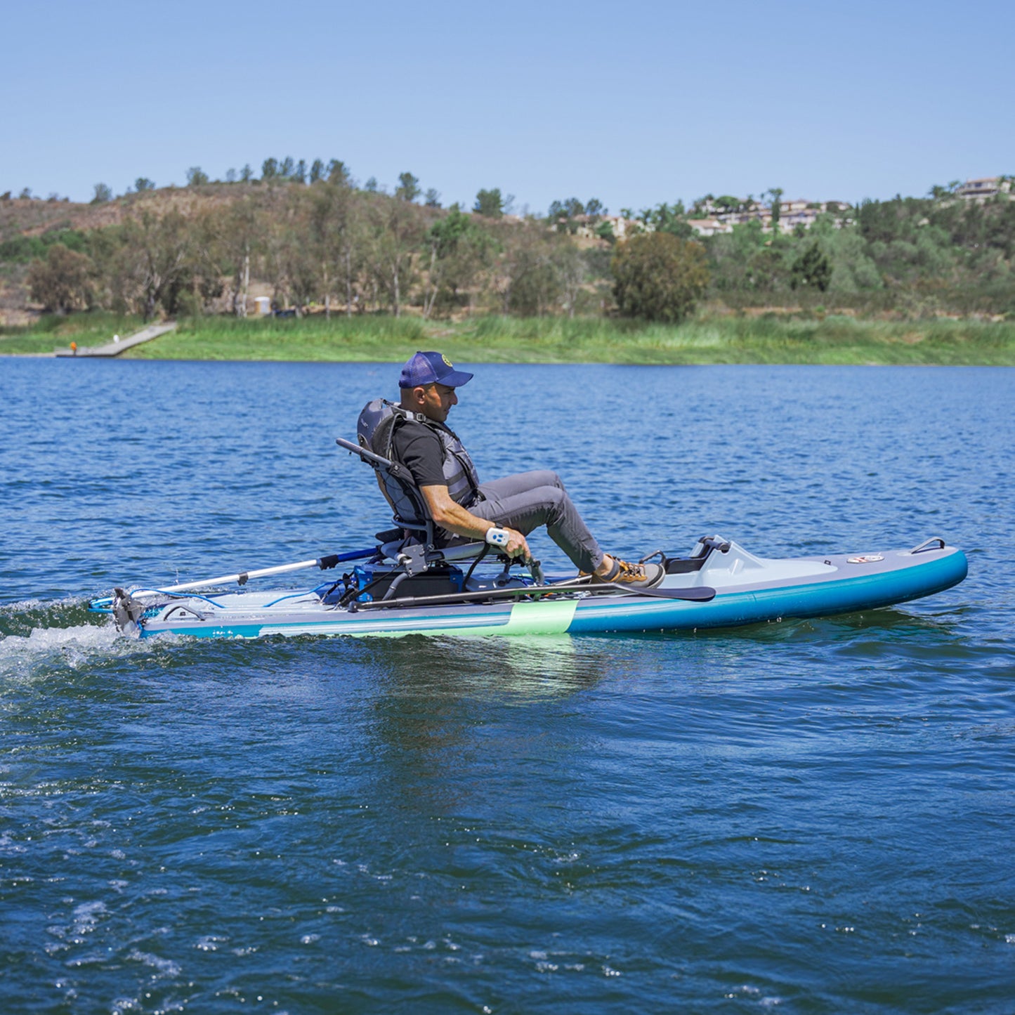 man using Bixpy K1 to propel Feelfree Profish