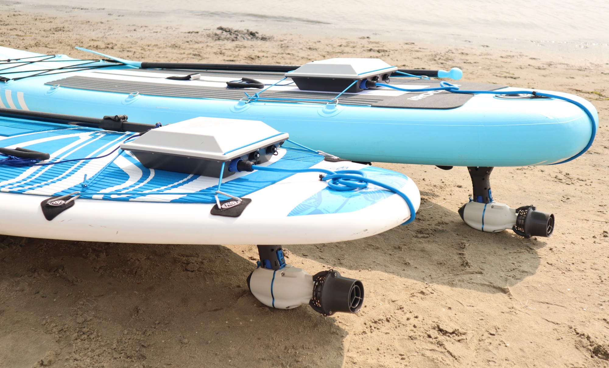 Paddleboards featuring Bixpy outboard batteries