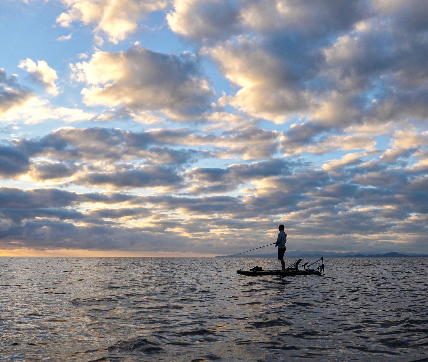 Man fishing from kayak using Bixpy K-1 Motor