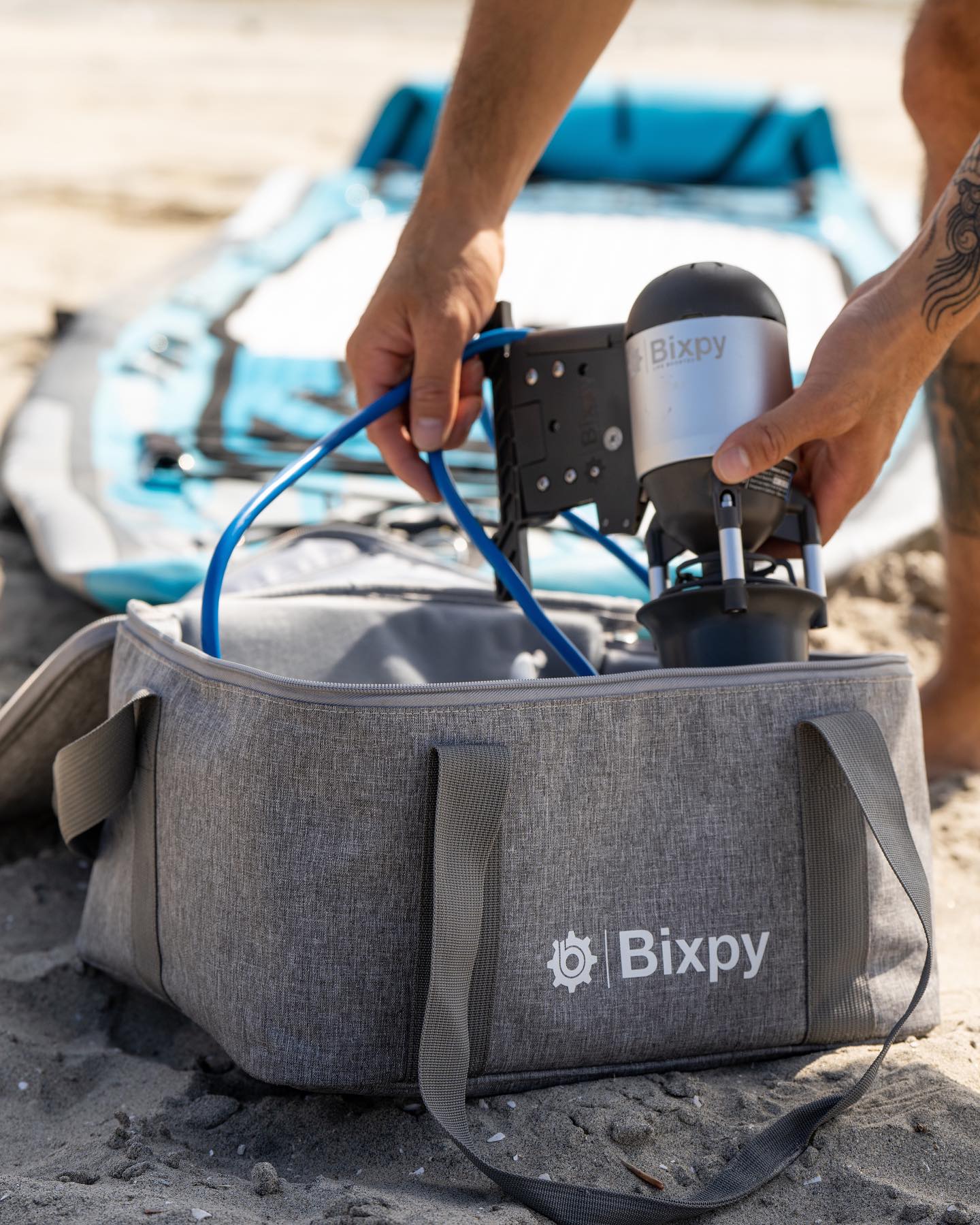 Bixpy K-1 Motor being put into waterproof bag