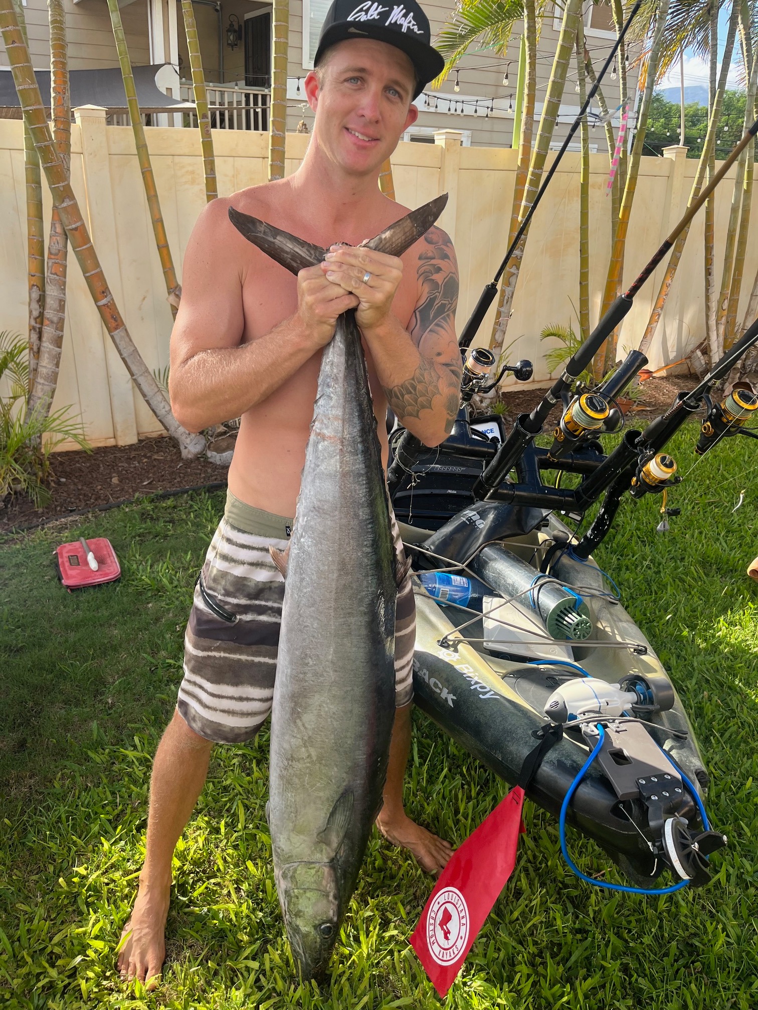 Man holding fish after using Bixpy K-1 Angler Kit