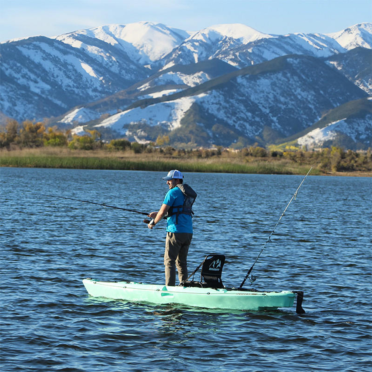 Man fishing from Hoodoo kayak with Bixpy adapter kit