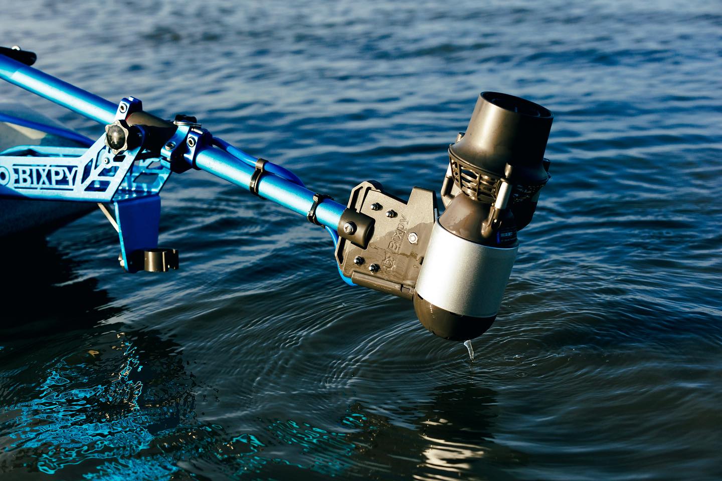 K-1 motor coming out of the water attached to a watercraft