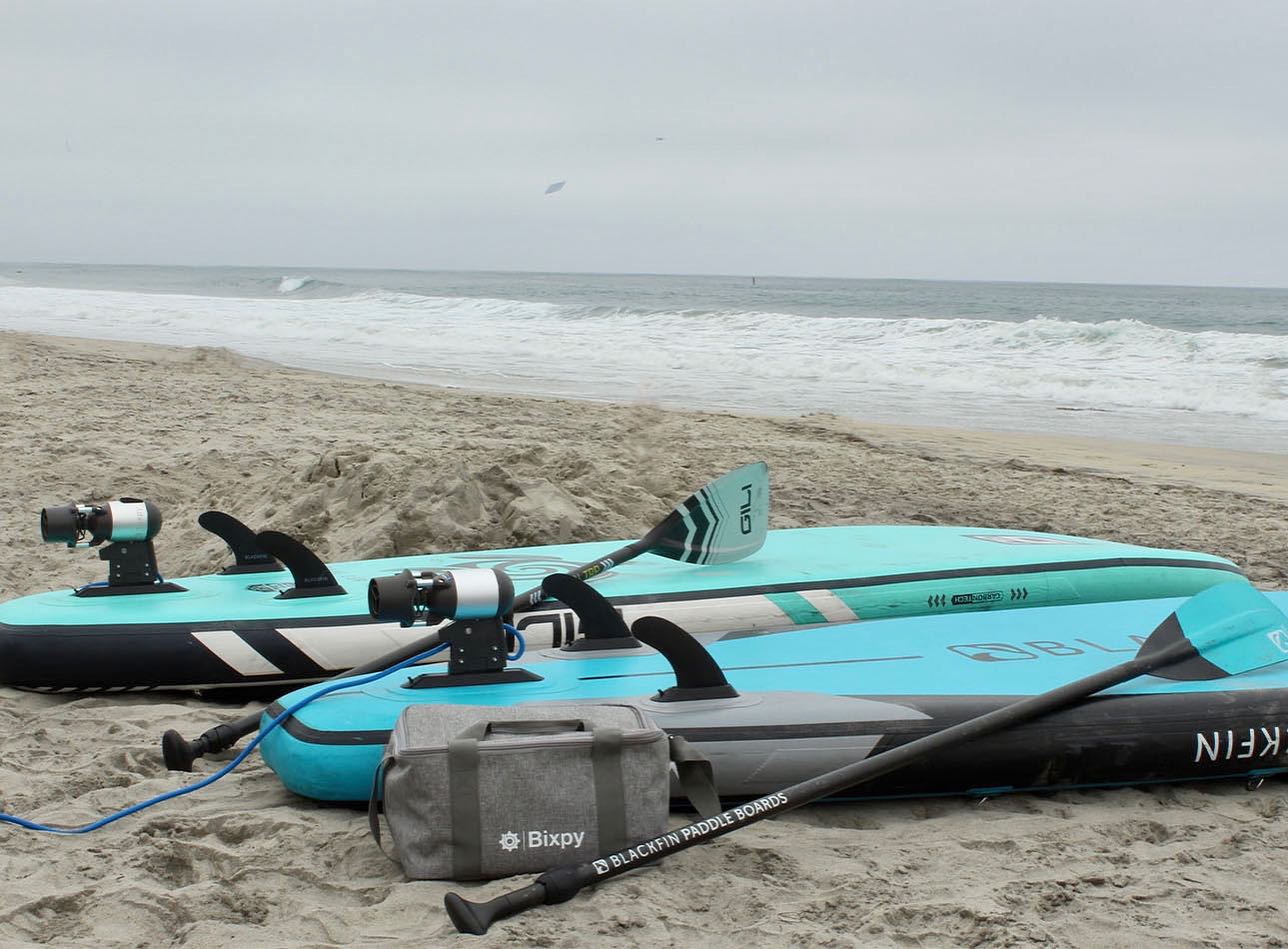 Bixpy k-1 motor and Bixpy travel bag with paddleboards