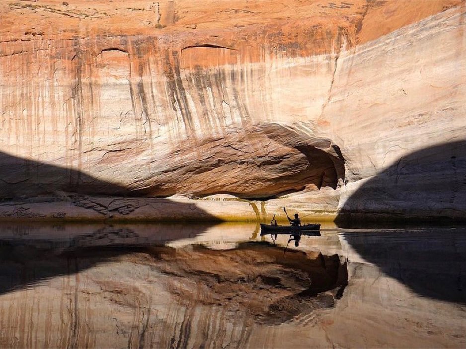 Person in kayak in canyon with Bixpy motor